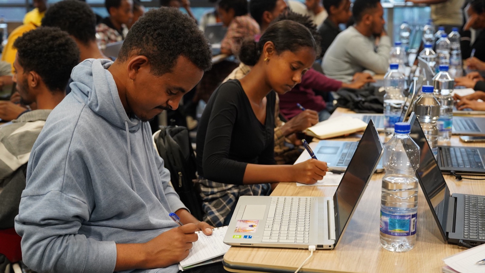 A2SV students working in an in-person education session